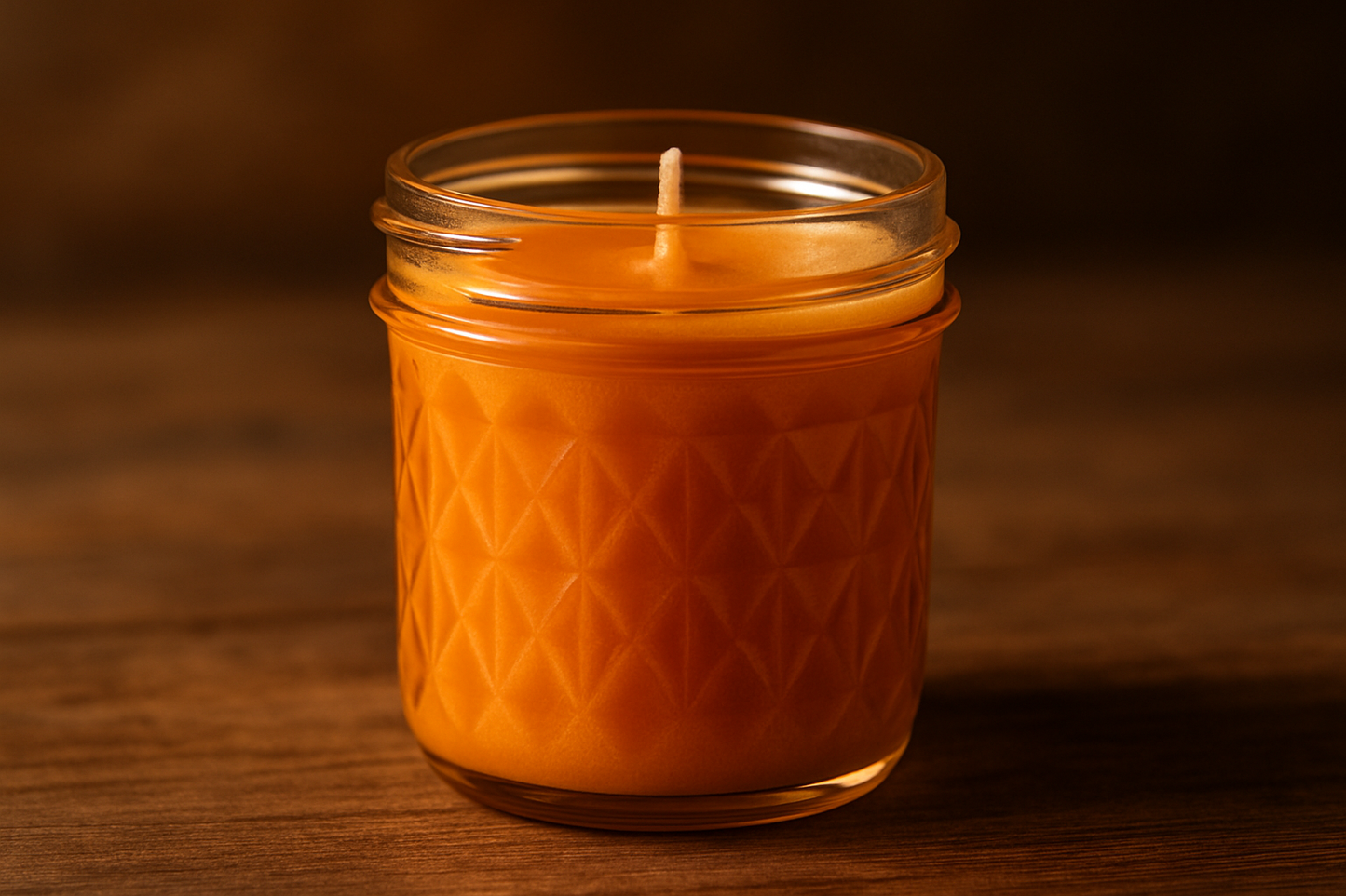 4oz mason jar candle with wax beings a hue between orange and gold